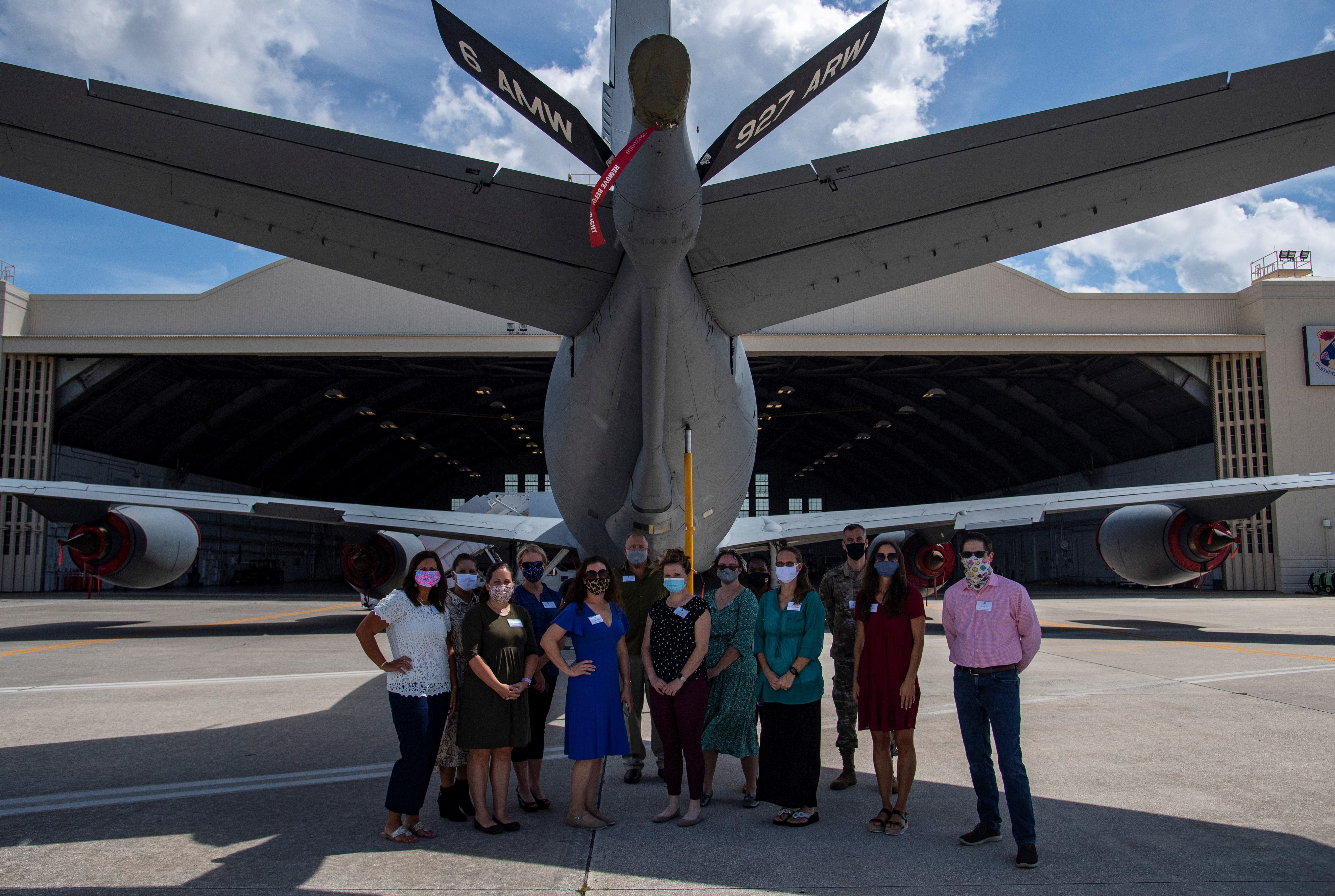 Team MacDill senior-leadership spouses stand next to a 6th Air Refueling Wing KC-135 Stratotanker aircraft during an immersion tour at MacDill Air Force Base, Florida, Sept. 24, 2020. The tour provided spouses, who may be new to the base, an in-depth look at the wing’s mission and familiarize them with base services and operations.